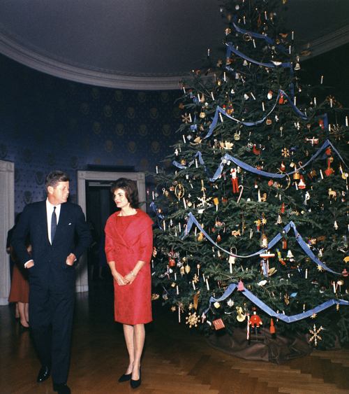 The Kennedys stand next to their Christmas tree in 1962