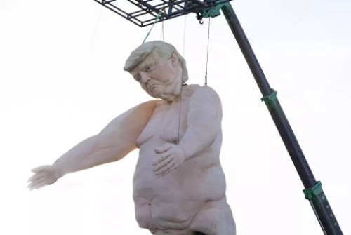 Trump's nude body is very
pale, has lots of fat and cellulite, and is very saggy