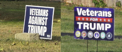 One sign is Veterans for Trump, one sign is Veterans against Trump