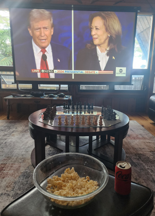 TV in the background,
popcorn and Coke in the foreground.