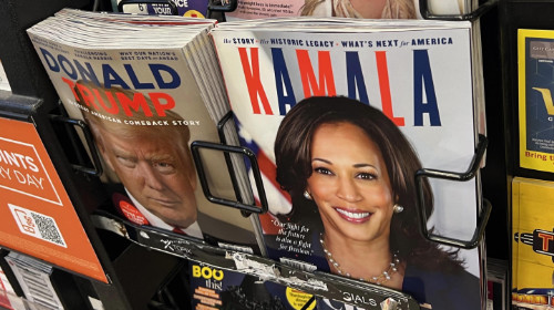 A newsstand with copies
of a Donald Trump magazine and a Kamala Harris magazine next to each other. There are probably 10 copies of the Trump magazine
still available, and only a couple copies of the Harris magazine.