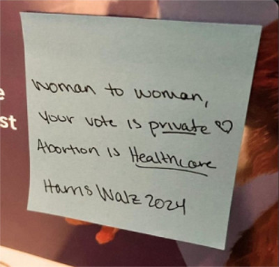 A Post-it Note says: 'Woman to woman, your vote is private, 
Abortion Is Healtheore Harris-Walz 2024