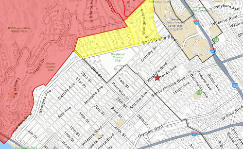 There is a large, red area in 
the north, then a much smaller yellow area south of that, then about eight blocks of non-threatened white area separating
that from (Z)'s residence.